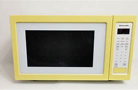 Image result for Whirlpool Tiny Yellow Microwave