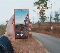 Image result for Clicking Photo Samsung Phone