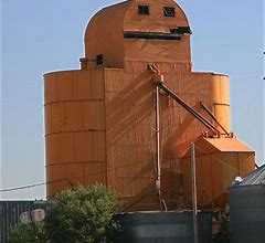 Image result for Weird Happy Face with Exploted Building in the Back Ground