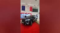 Image result for 2023 Toyota Camry XLE Mica Pre-Dawn Grey