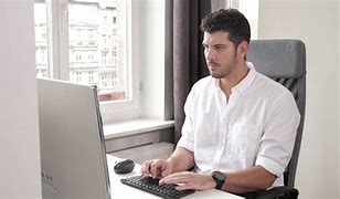 Image result for Person at Computer Desk