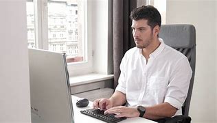 Image result for Man Using Computer Desk