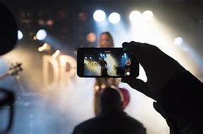 Image result for Phone Thrown at Concert