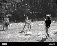 Image result for Children Playing Swingball