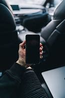Image result for Man Holding Red iPhone