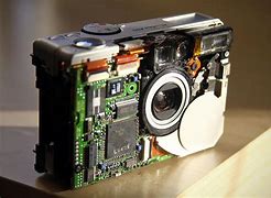 Image result for Taking Apart a Camera