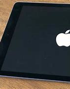 Image result for iPad White Screen with Apple Logo