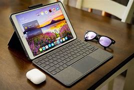 Image result for iPad with Keyboard and Pen