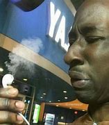 Image result for Guy Holding Smoking AirPod