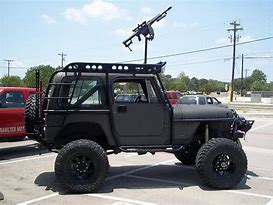 Image result for Jeep with a Roof Gun