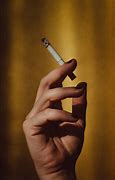 Image result for Hand Loosley Holding Cigarette