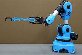 Image result for Robot Arms at Auto Factory