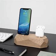 Image result for Photo of iPhone On Charging Pod