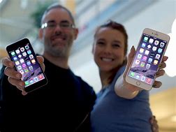 Image result for People with iPhones in Hands