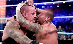 Image result for wwe funny face undertakers