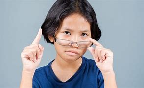 Image result for Child Being Fitted with Eyeglasses