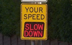 Image result for Vehicle Slow Down Sign