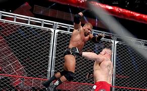 Image result for Triple H vs Brock Lesnar