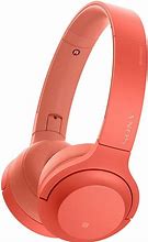 Image result for Sony Wireless Headphones with Stand Red
