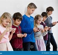 Image result for Kids Holding a Flip Phone