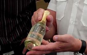 Image result for Gold Flakes in Champagne