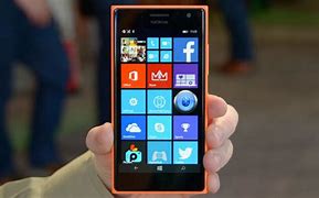 Image result for Lumia 730 Red Vs. Orange