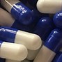 Image result for Blue and White Capsule with E615