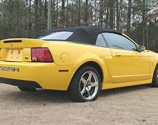 Image result for yellow mustang cobra