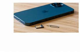 Image result for Image of Sim Card Compartment On a iPhone 12