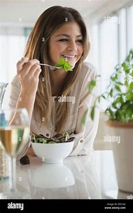 Image result for Woman Sitting Eating Salad