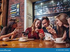 Image result for People On Phones at Table