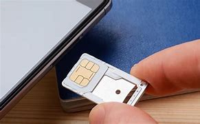 Image result for Pulling Out Sim Card