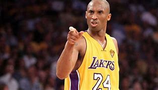 Image result for Kobe Sits with Trophies