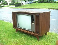 Image result for Console Stereo TV with Thick Cabled Box Controller