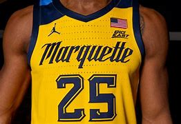 Image result for Marquette Warriors Bumblebee Striped Uniforms