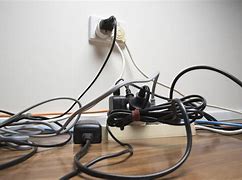 Image result for Tangled Cords and Power Strip
