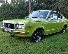 Image result for Mazda RX3 Yellow