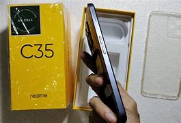 Image result for iPhone XS vs Real Me C53 Size Comparison