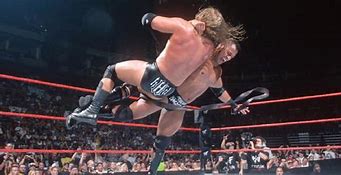Image result for The Rock vs Triple H Ladder Match