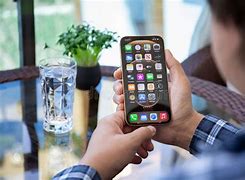 Image result for Man Hand Holding iPhone 12