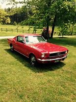 Image result for 65 Mustang Candy Apple Red