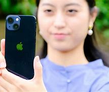 Image result for iPhone 13 Black in Hand