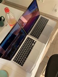 Image result for Apple Mac Space Gray vs Silver