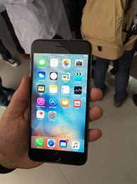 Image result for iPhone 6s Plus Size in Hand