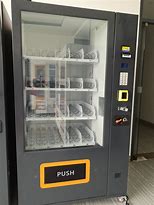 Image result for Vending Machine Taser