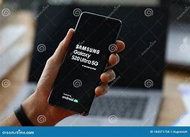 Image result for hands hold samsung phones