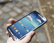 Image result for Hand Holding of Samsung Galaxy S4