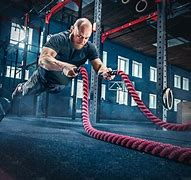 Image result for Men Fighting Holding a Rope