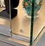 Image result for Lighted Locking Electric Rotating Jewelry Display Cases