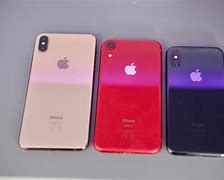 Image result for iPhone XR in Hand and XS